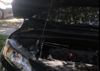 this image shows car mechanic in Oakland, CA